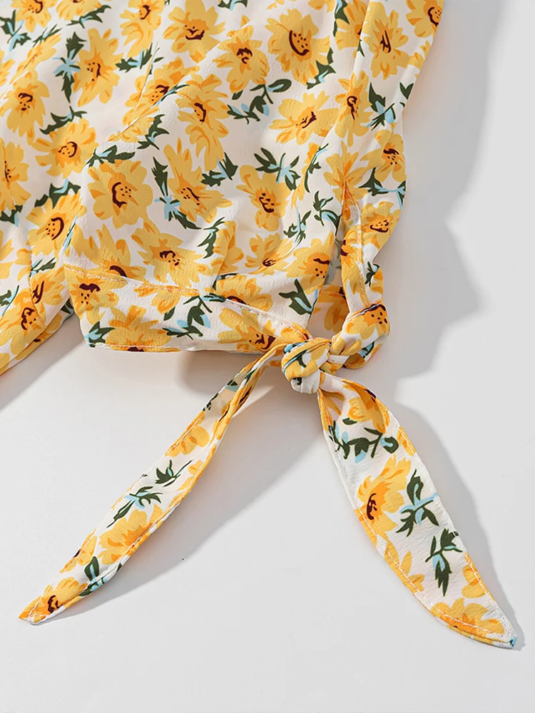 فستان صيفي جديد على الطراز الأوروبي والأمريكي للفتيات الفرنسيات باللون الأصفر مطبوع عليه زهور اللوتس وحاشية ربطة عنق الخصر وأكمام قصيرة