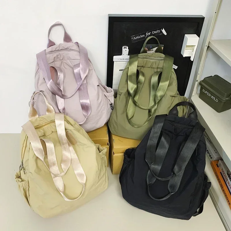 2024 Hot Sale Casual Simple Large Capacity Nylon Backpacks Youth Zipper Solid Color Bags for Unisex Commuting Bolso Mujer