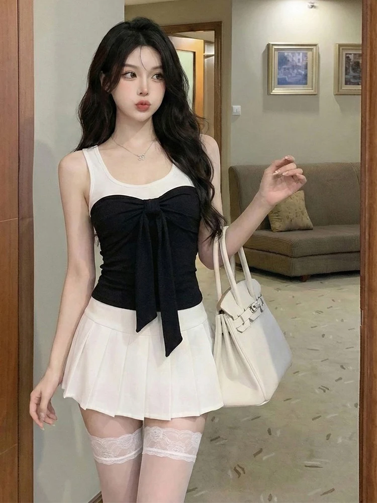 Sexy contrasting color round neck versatile slim fit bow vest with chest cushion high waist pleated short skirt two piece set