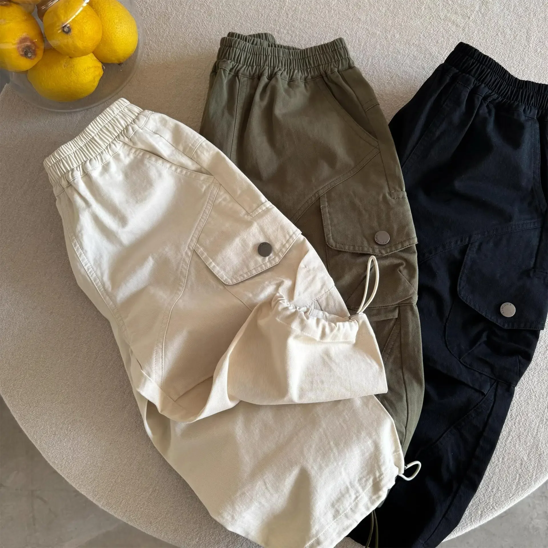 

Children's Trousers Spring Boys And Girls Solid Color Pocket Crane Pants Baby Drawstring