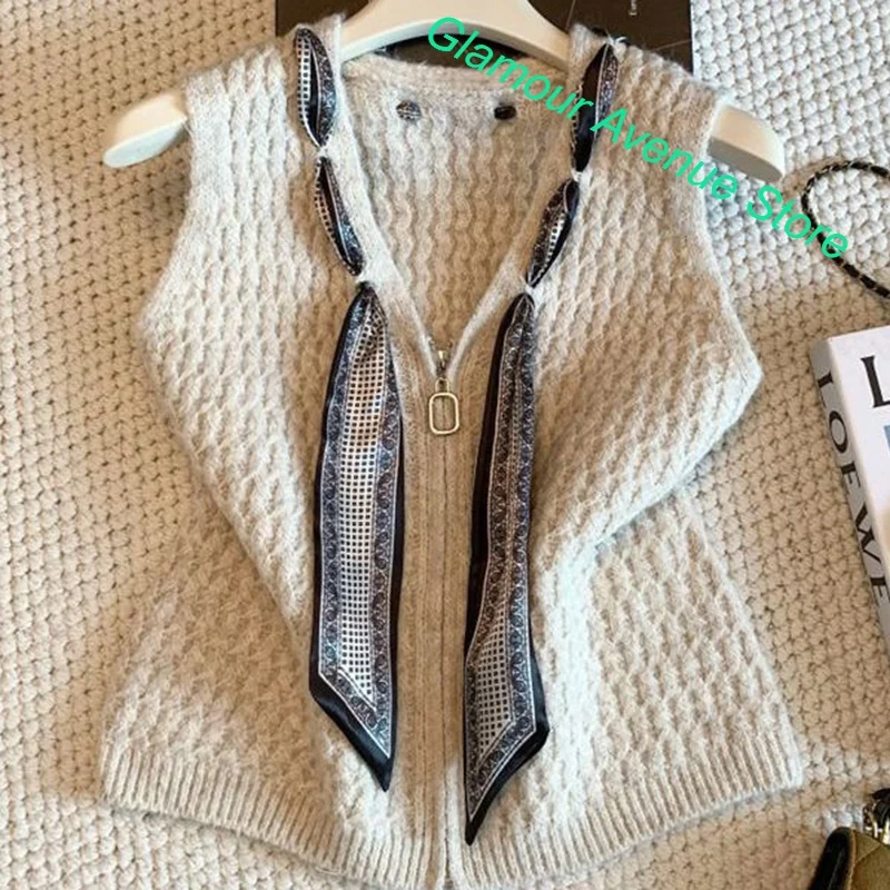 Korean V-neck knitted fashion sleeveless vest sweater women's autumn and winter new high-grade loose stacked top with silk scarf