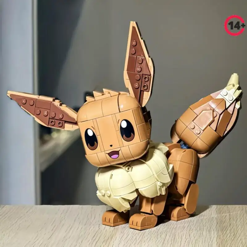 

2026 IN STOCK 587pcs Hot Game Magical Pet Pocket Elf Fox Eevee Building Blocks Figure 3D Model Bricks Toy For Birthday Gifts