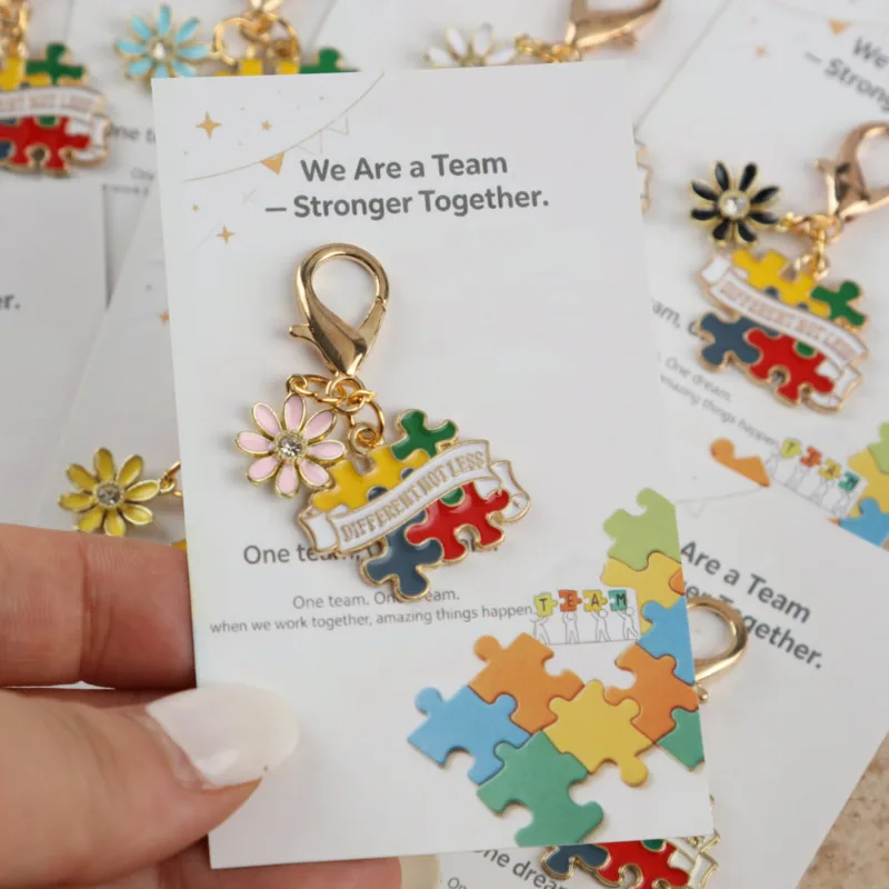 14pcs 2dAutism Prevention Illustration Series Keychain Set Comes with team motivational cards To a friend at work，Suitable for b