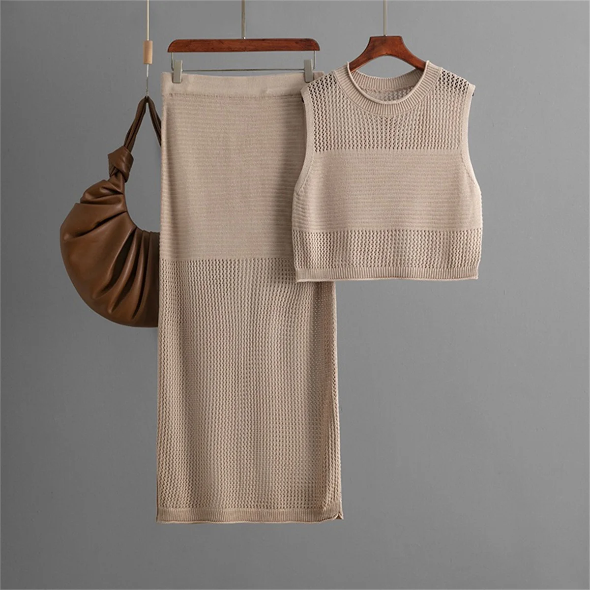 

Europe and the United States Solid Hollow out Vacation Knitting Two Piece Sets Women's Knit Vest and Split Long Skirt Suits