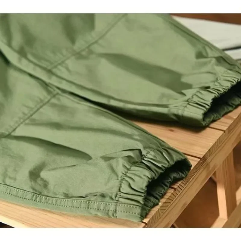 Spring and Autumn Men\'s Loose Solid Color Versatile Pocket Tie Feet ShirringBandage Casual Fashion Elegant Commuter Work Pants