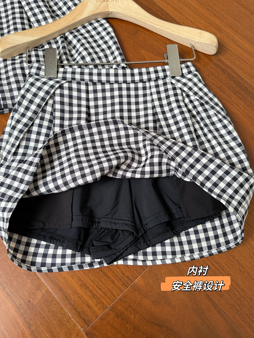 กระโปรงสั้นทรงเอเอวสูง กระโปรงสั้นลายตารางสีดำและสีขาวแฟชั่นอเนกประสงค์ของผู้หญิงกระโปรงสั้นกระโปรงดอกไม้