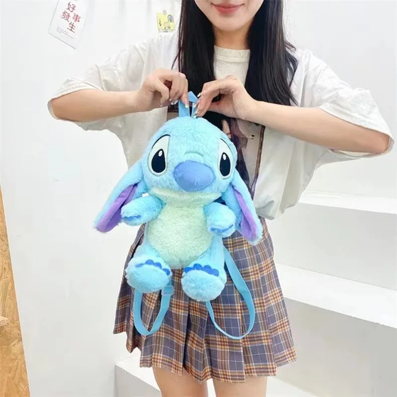 Nueva mochila de felpa de dibujos animados de Disney, bolso de hombro de muñeca Kawai Stitch, mochila escolar para niños de estilo otoño e invierno, regalos para guardería