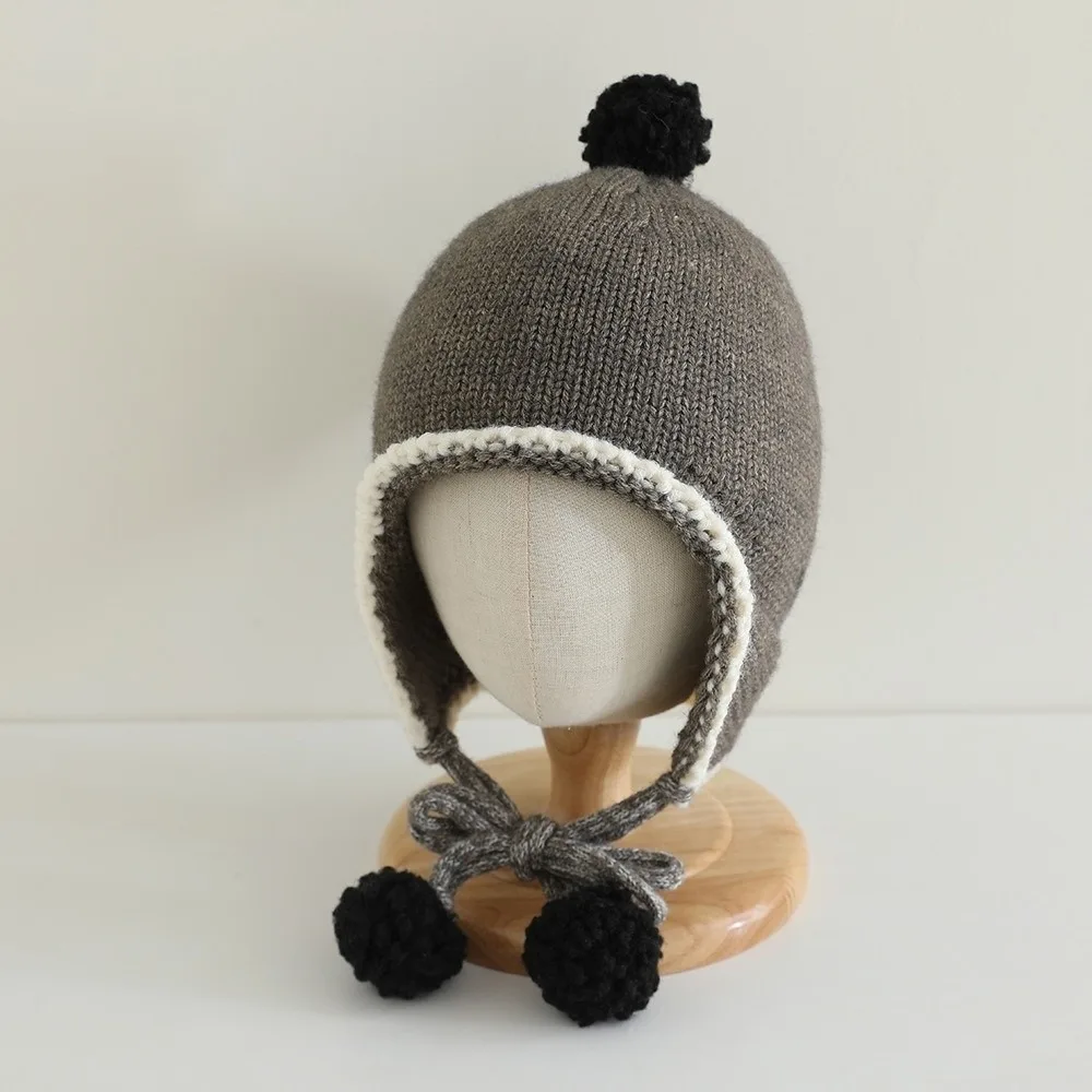

Korean Winter Baby Knitted Cap Tassel Bobbles Baby Beanie Cap Warm Thick Ear Protection Hat Kids