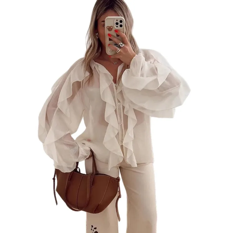 Diseño francés de alta gama, temperamento de color sólido, cremallera con borde de volantes de gasa, versátil y cómoda, camisa holgada de manga larga