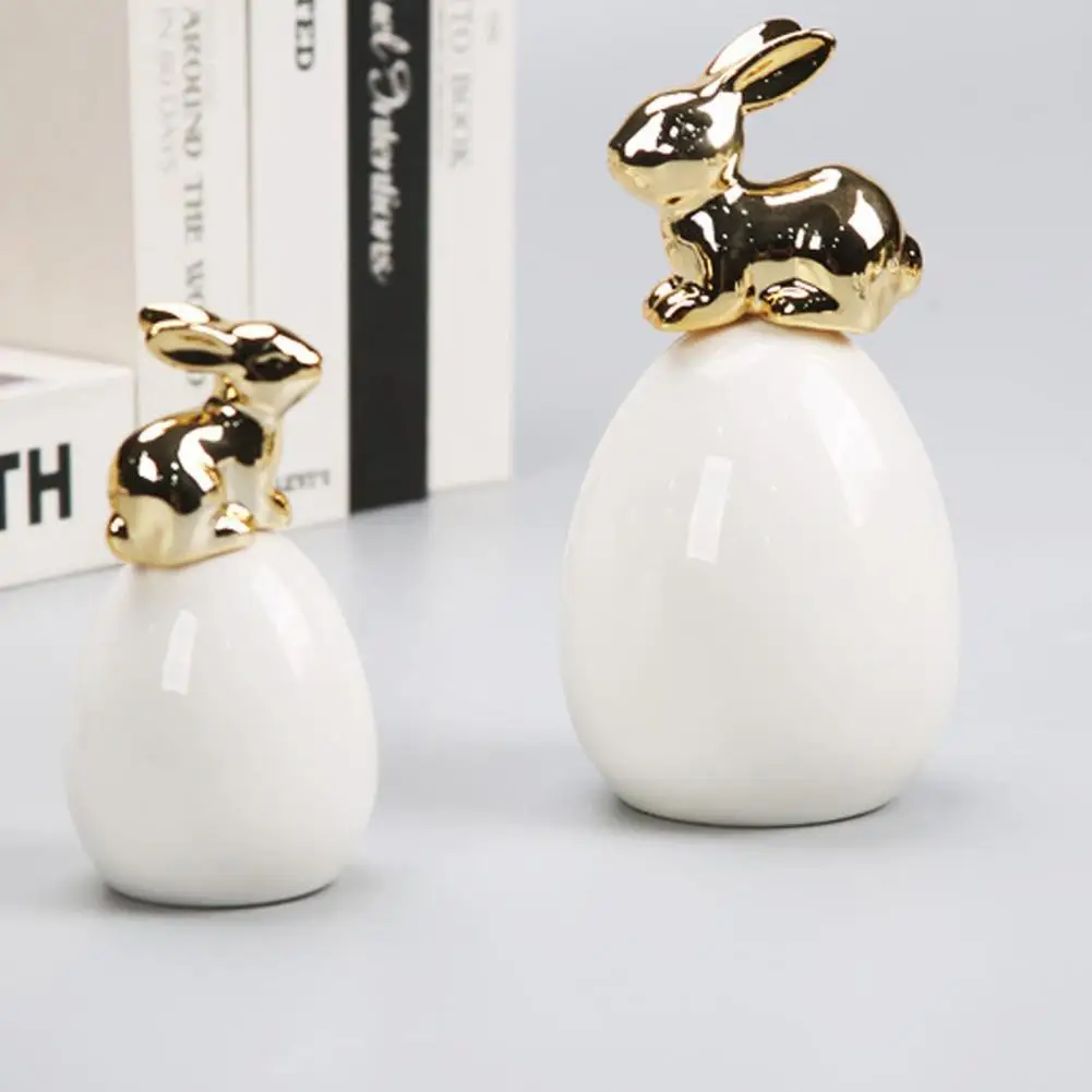 

Stylish Home Accent Piece Bunny Figurine Decor Modern Ceramic Easter Bunny Figurine Gold Rabbit on Egg Ornament Spring for Home