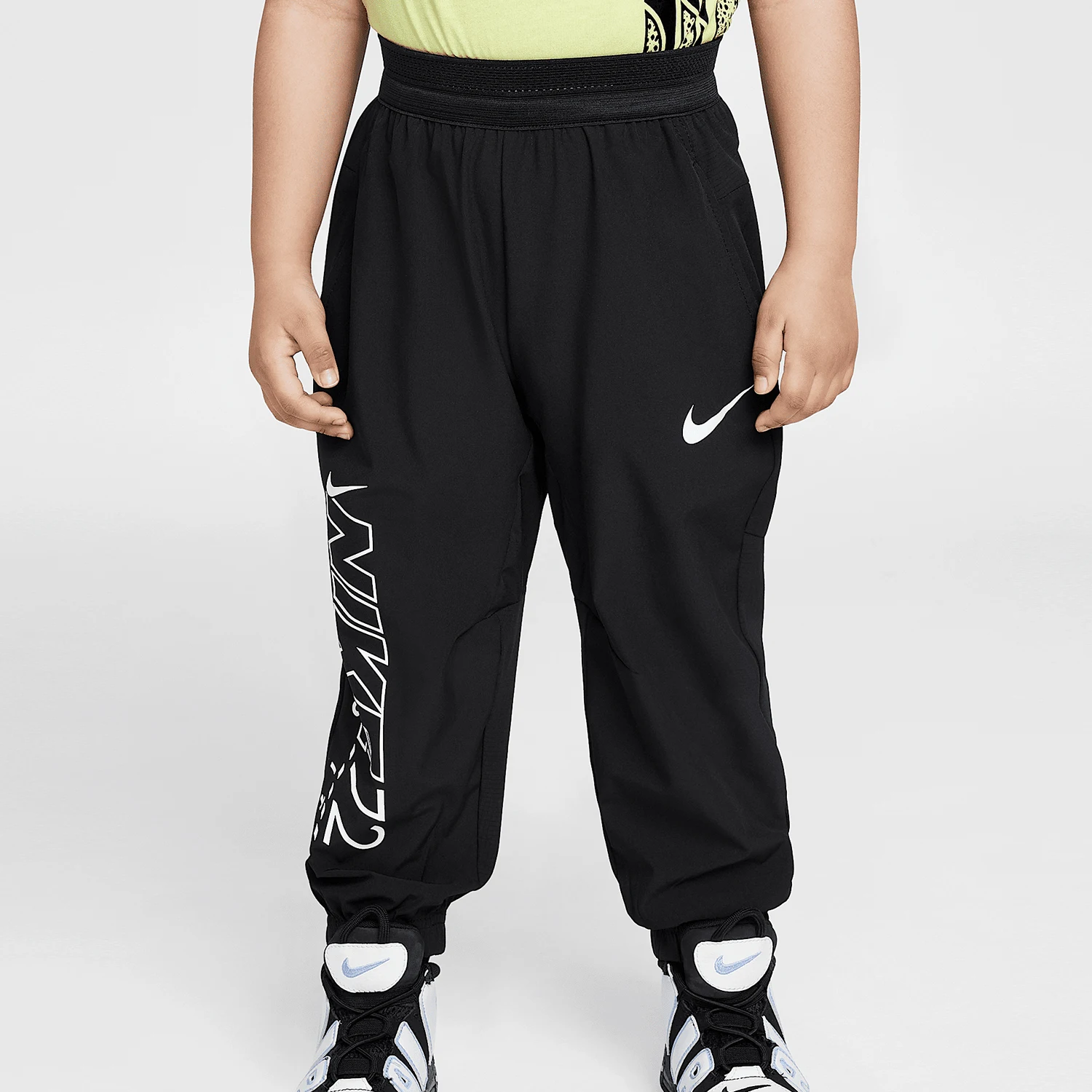 Оригинальные детские спортивные брюки Nike Dri FIT с завязками на щиколотке для активного отдыха на природе, модель II2491-010.