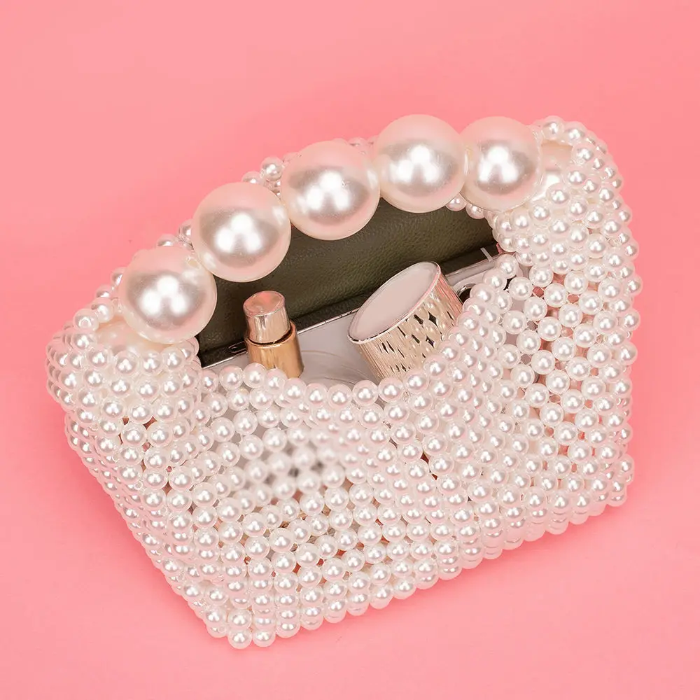 European and American style new beaded handbag Summer women\'s pearl bag hand woven wrist bag Fashion temperament handbag