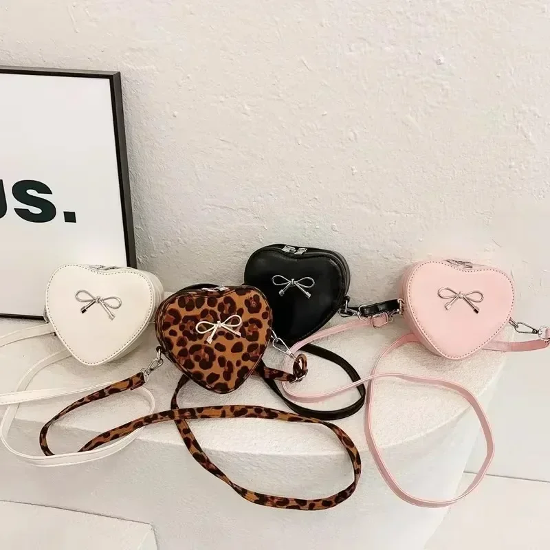 Bolsos de hombro para mujer con cremallera de PU de Color sólido con forma de corazón, bolsos nuevos de leopardo de gran capacidad de alta calidad para mujer, gran oferta 2025