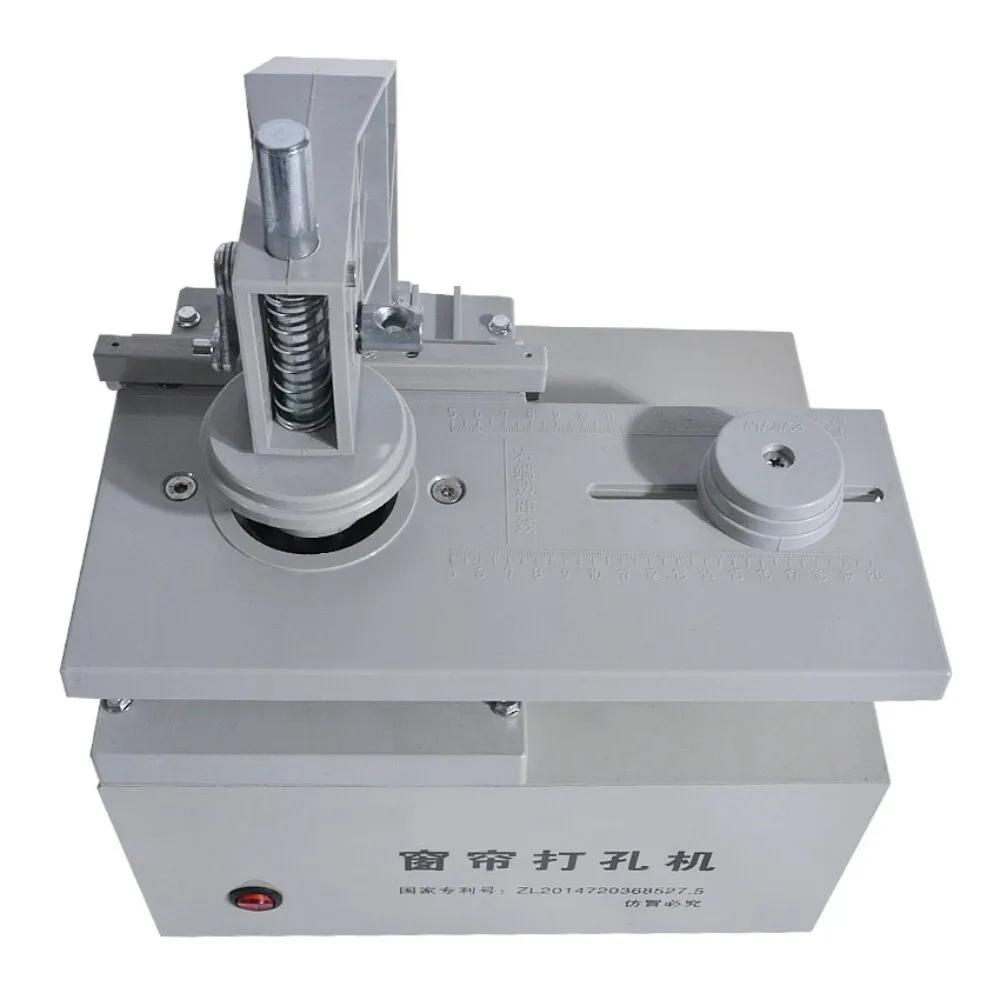 Macchina per occhielli per tende elettriche, punzonatrice per tende elettriche