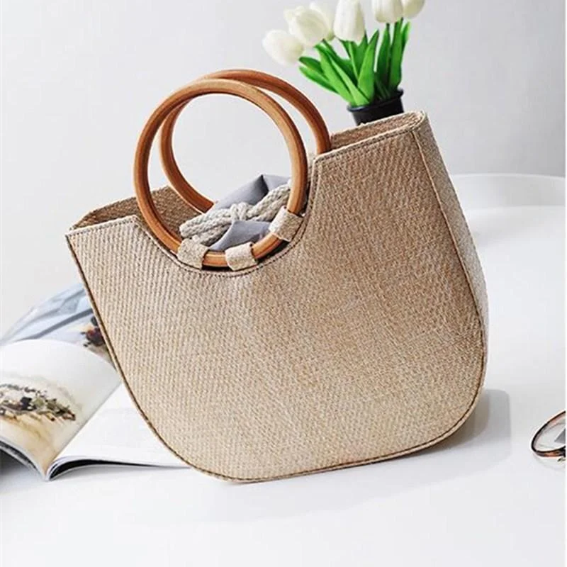 

2023 Spring New Korean Edition Simple Grass Woven Round Wooden Handle Handbag with Single Shoulder Crossbody Woven Women's Bag