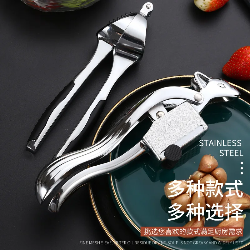 

Household garlic masher for pressing garlic in kitchen thickened zinc alloy manual pull multifunctional garlic masher