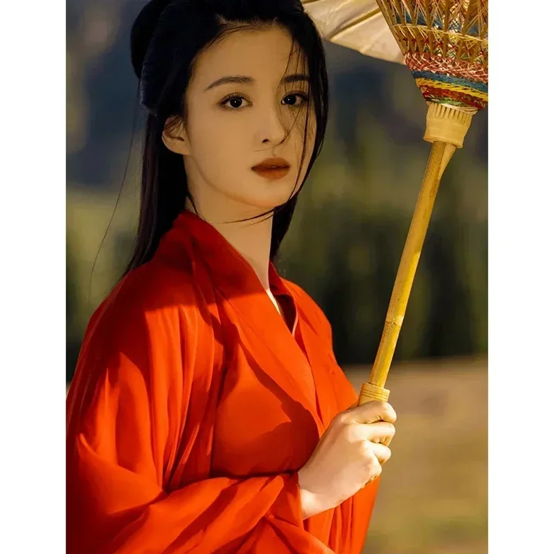 ชุดฮั่นฝูฝูเจชุดคอสเพลย์ผู้หญิงนักดาบหญิงชุดราชวงศ์ถังชุดชุดเดรสเต้นรำบนเวทีสีแดงแบบดั้งเดิมของจีน