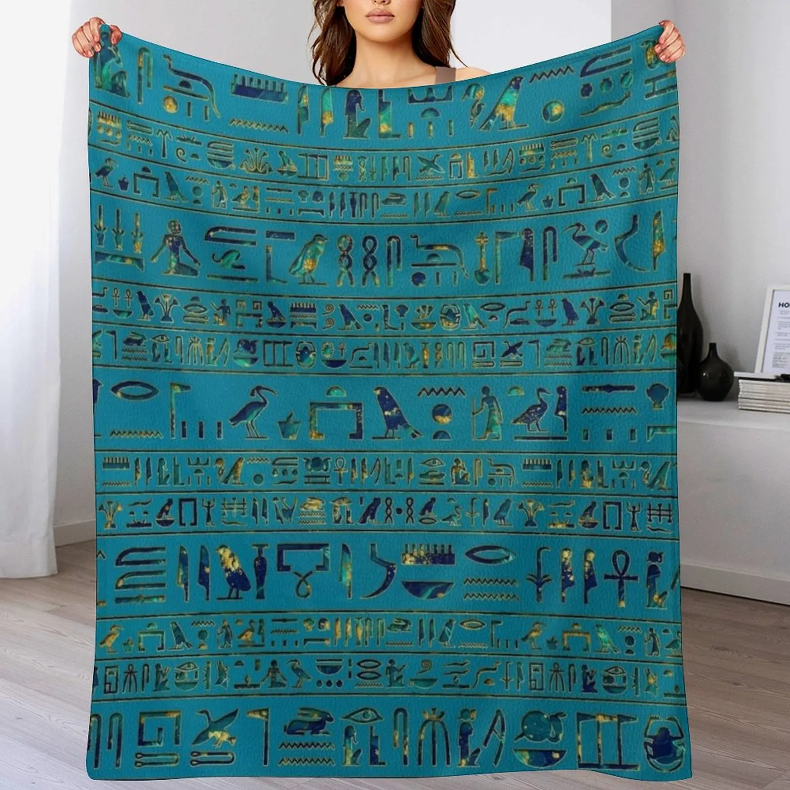 

Egyptian hieroglyphs on teal leather texture Throw Blanket