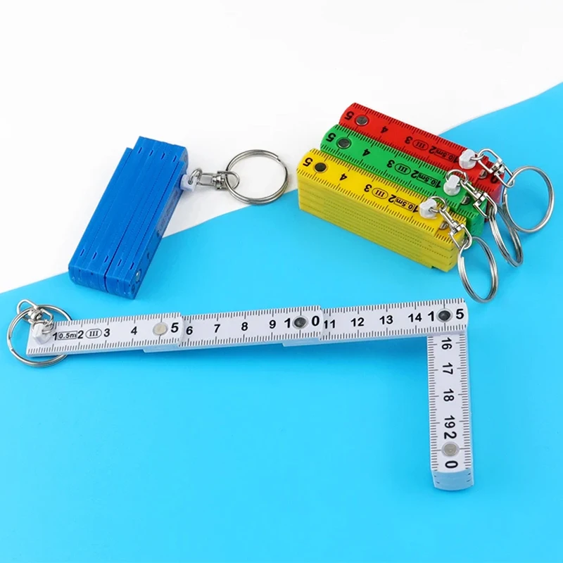 

Compact Folding Ruler Keychain 0.5m Portable Measuring Tool Plastic Keychain For Drawing NEW 1-5PCS Solid Color 50cm Ruler Tools