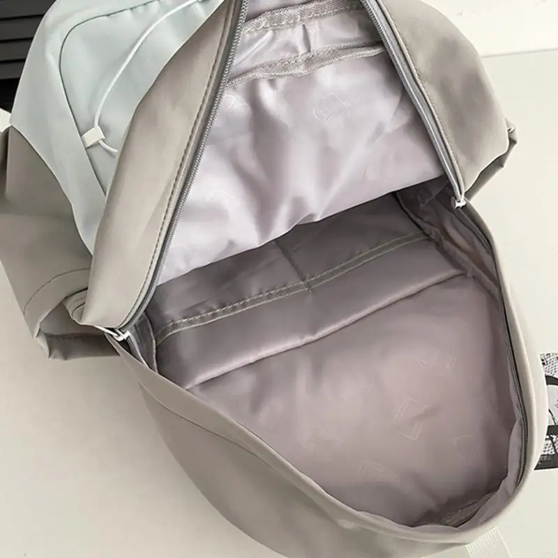 X7XC Fashionable Contrast Color Backpack with Bungee Cord for Teens Adults Large Capacity School Bag with Laptop Compartment