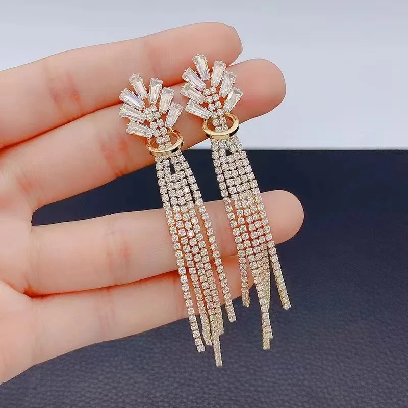 

European and American fashion sparkling women's silver needle temperament earrings women's long tassel earrings holiday gift