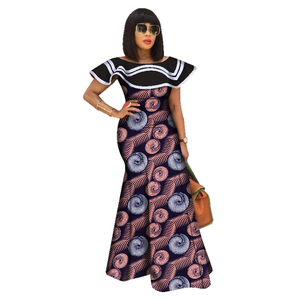 Black Dress with a Touch of Chitenge: How This Afro-Chic Design Transformed My Wedding Guest Outfit Black Dress with a Touch of Chitenge: How This Afro-Chic Design Transformed My Wedding Guest Outfit