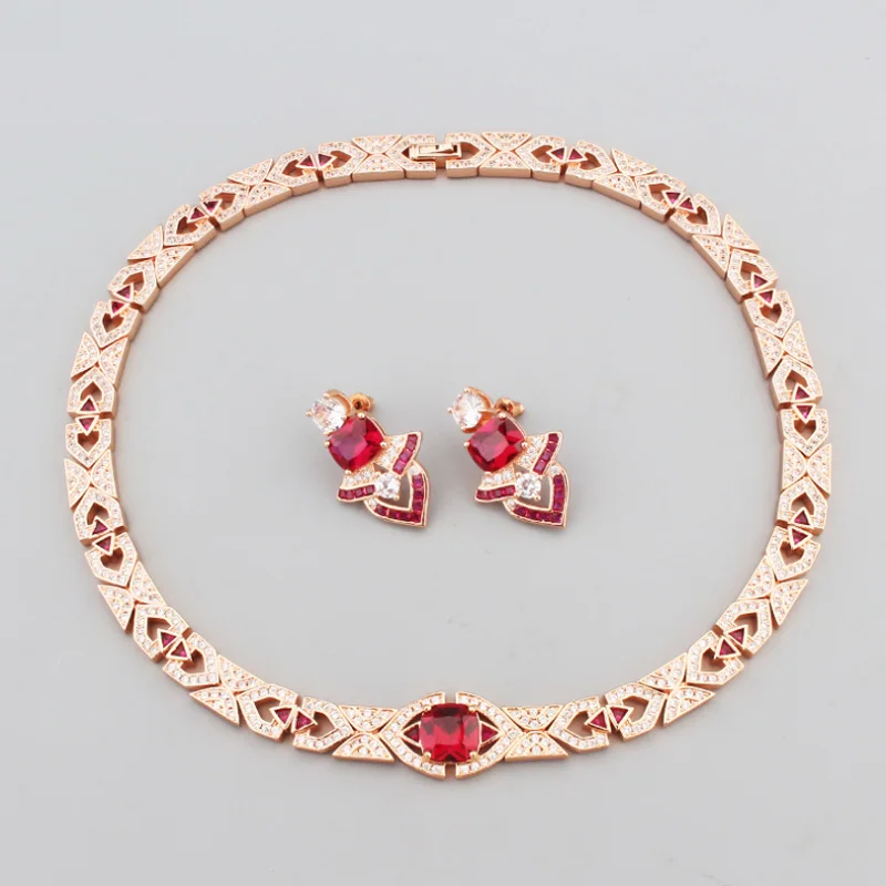 

Bobokiki Jewelry Fashion New Titanium Steel Micro-Inlaid AAA Red Zircon Necklace Earrings Luxury Two-Piece Set.