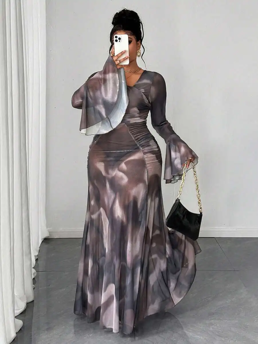 

Semi-Sheer Asymmetrical Long Sleeve Maxi Dress with Ruched Detail