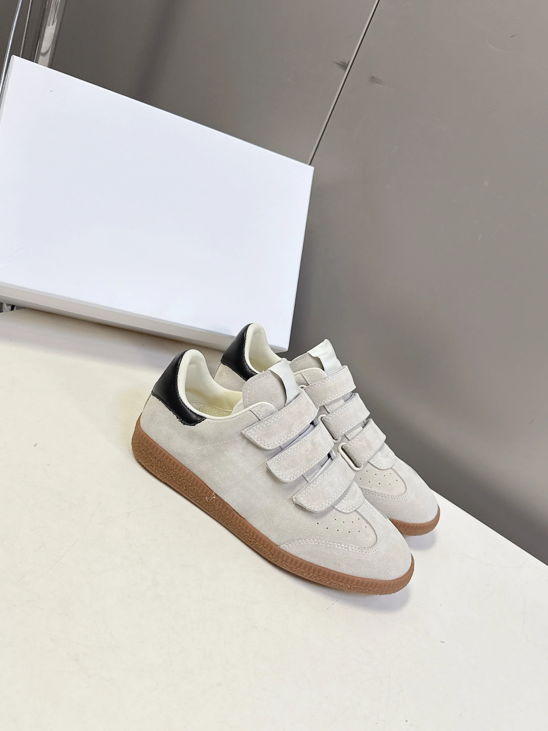 

New neutral suede casual shoes - featuring a hook-and-loop strap design, contrast heel details, and a vintage style