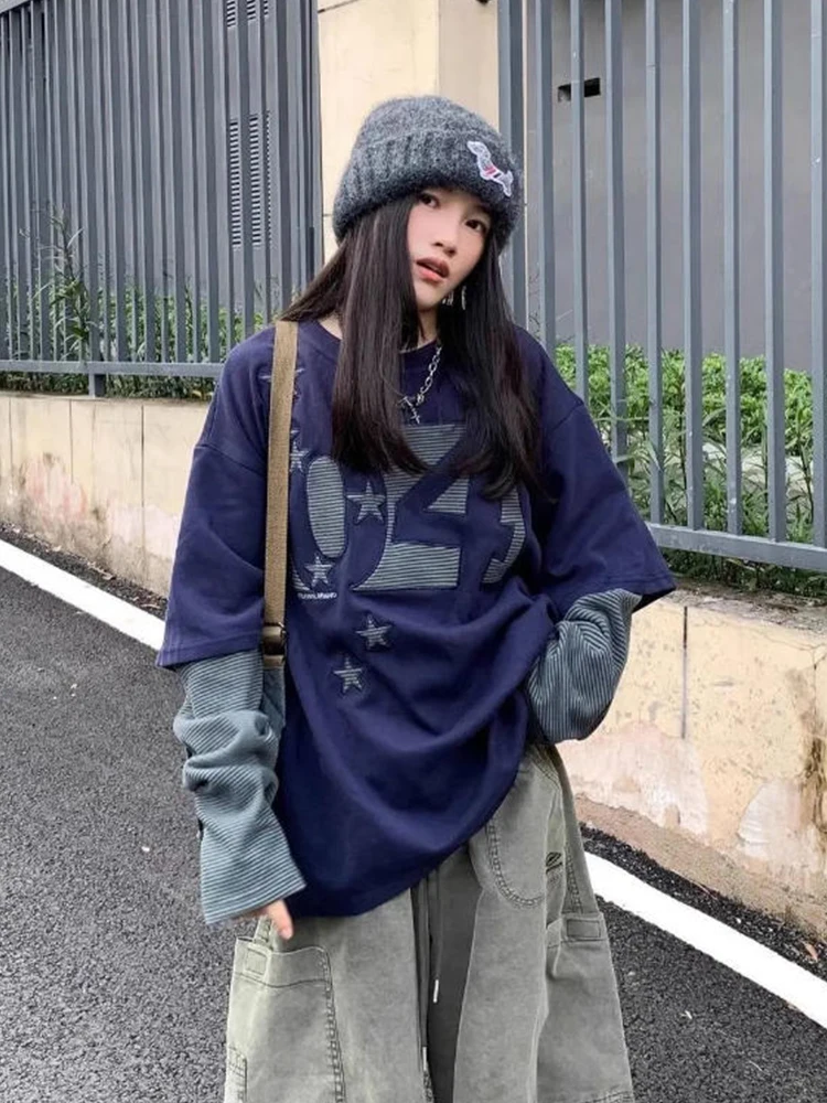 เสื้อยืดสไตล์อเมริกันย้อนยุค แขนยาว ทรงหลวม ช่วยพรางหุ่น แฟชั่นสำหรับผู้หญิง ดีไซน์ใหม่ ทันสมัย เหมาะสำหรับฤดูใบไม้ร่วงและฤดูหนาว สวมใส่สบายๆ