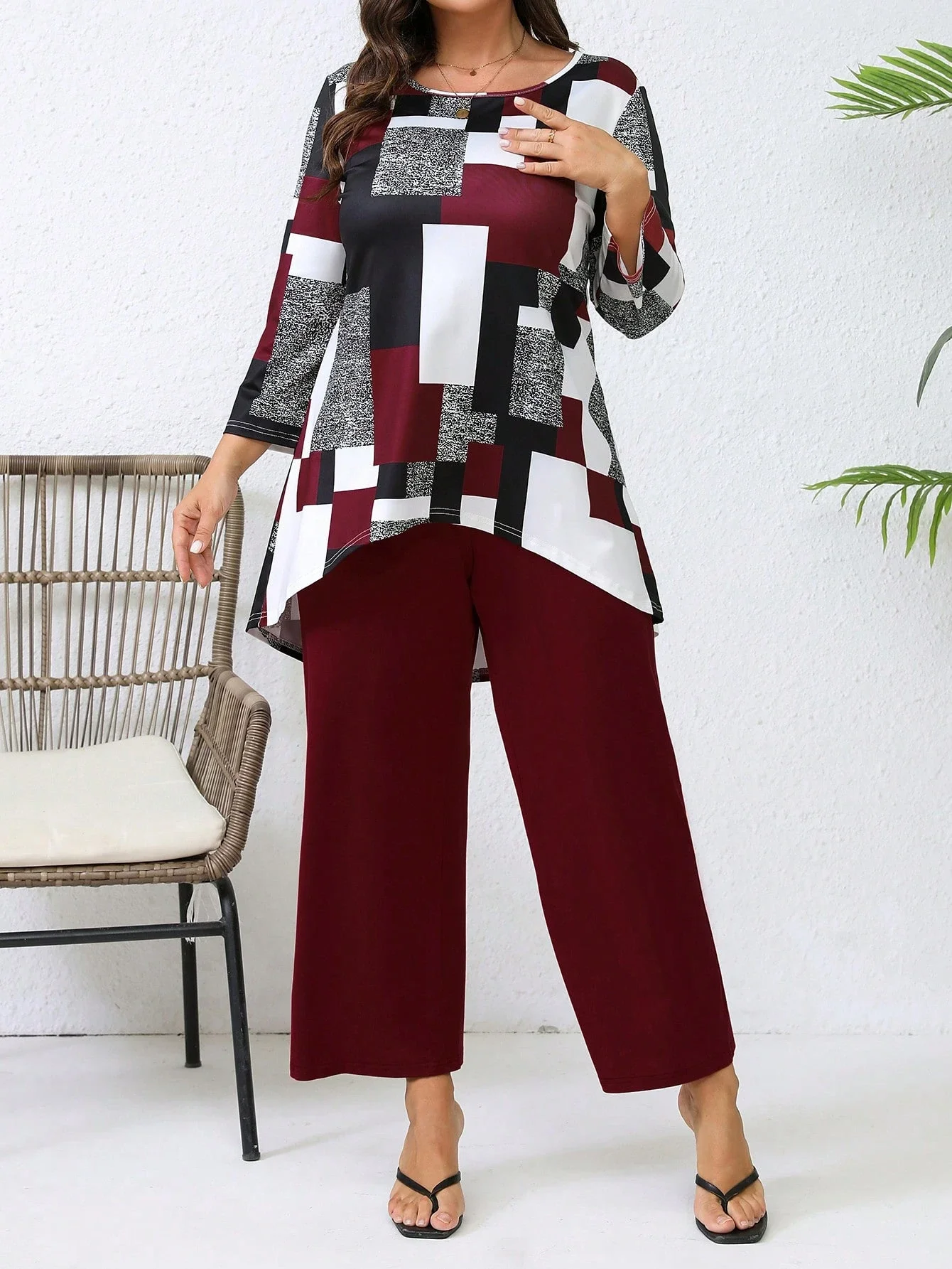 

2pcs Plus Size Casual Geometric Print Asymmetric Top And Solid Wide Leg Pants Set