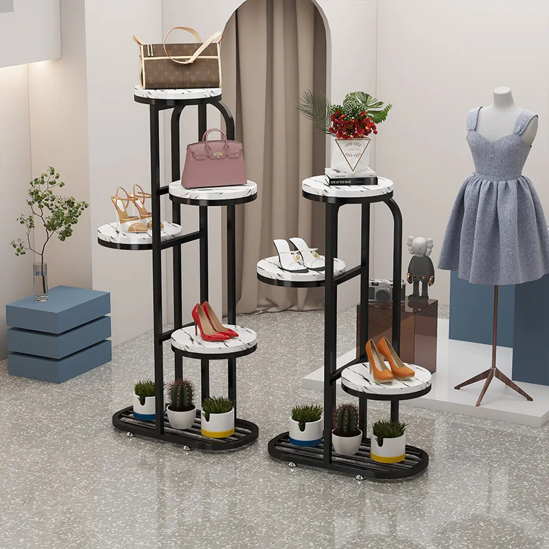 Shoe store floor-to-ceiling window display bag rack shoe rack golden iron clothing store display shelf flower