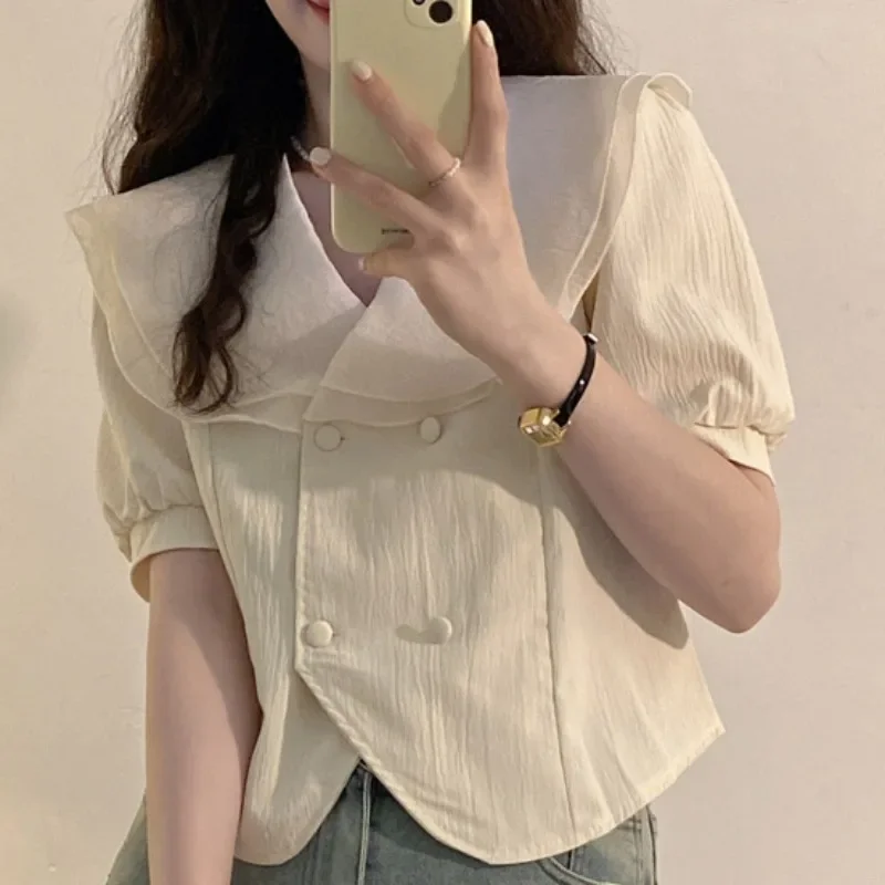 Camicia fresca a maniche corte da donna Estate 2025 Camicie con colletto alla Peter Pan in stile coreano con bordo a foglia di loto