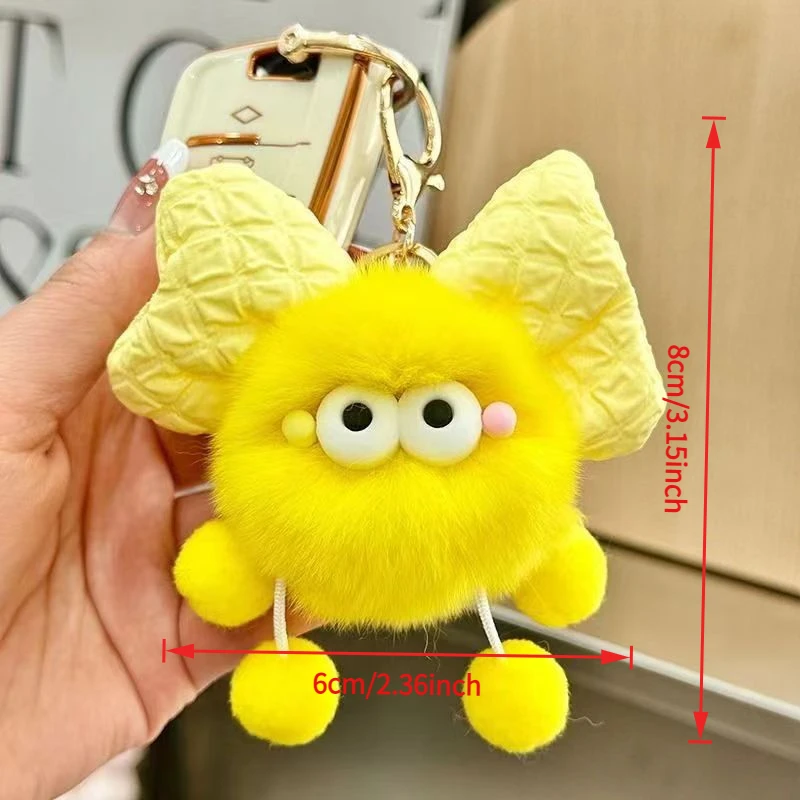 Cute dopamine elf plush keychain with big eyes, bow & bell. Perfect for bags,phones & gifts. Great for family, friends & lovers.
