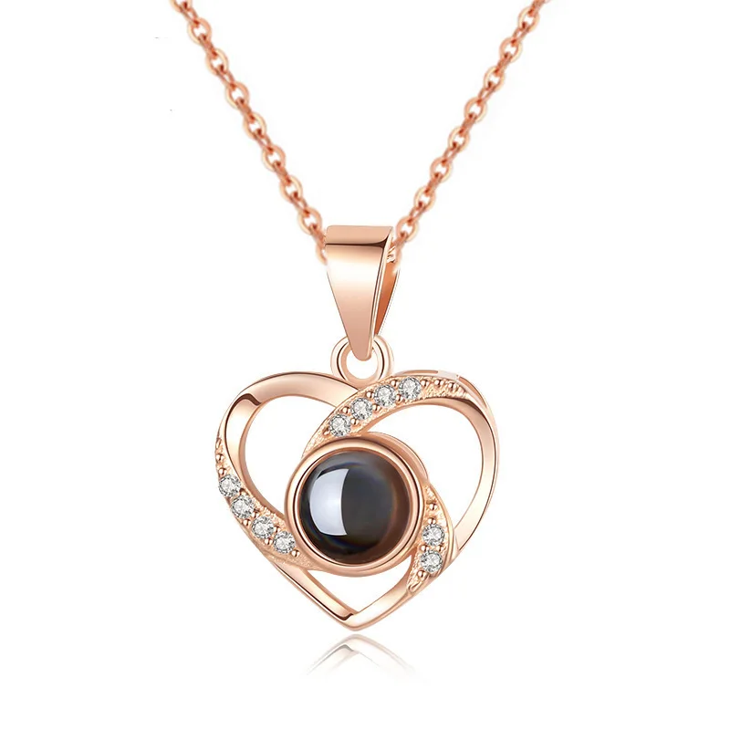 Titanium steel choker with heart-shaped pendant featuring multilayered design and cross-chain styling in fade-resistant rose gol
