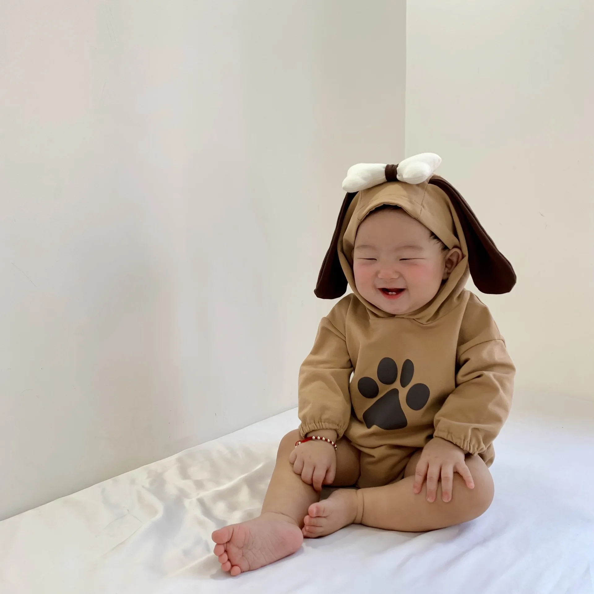 Ins Adorable chiot infantile à capuche barboteuse automne 2025 nouveau-né combinaison célébration Photo Shoot tenue bébé garçon fille vêtements