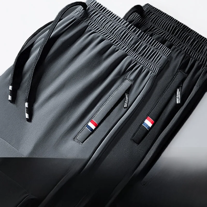 

Qui Dry Ice Silk Свободный крой Повседневные спортивные брюки мужские большие размеры Летняя тонкая модель ВВС ket Без глажки Молодежный тренд