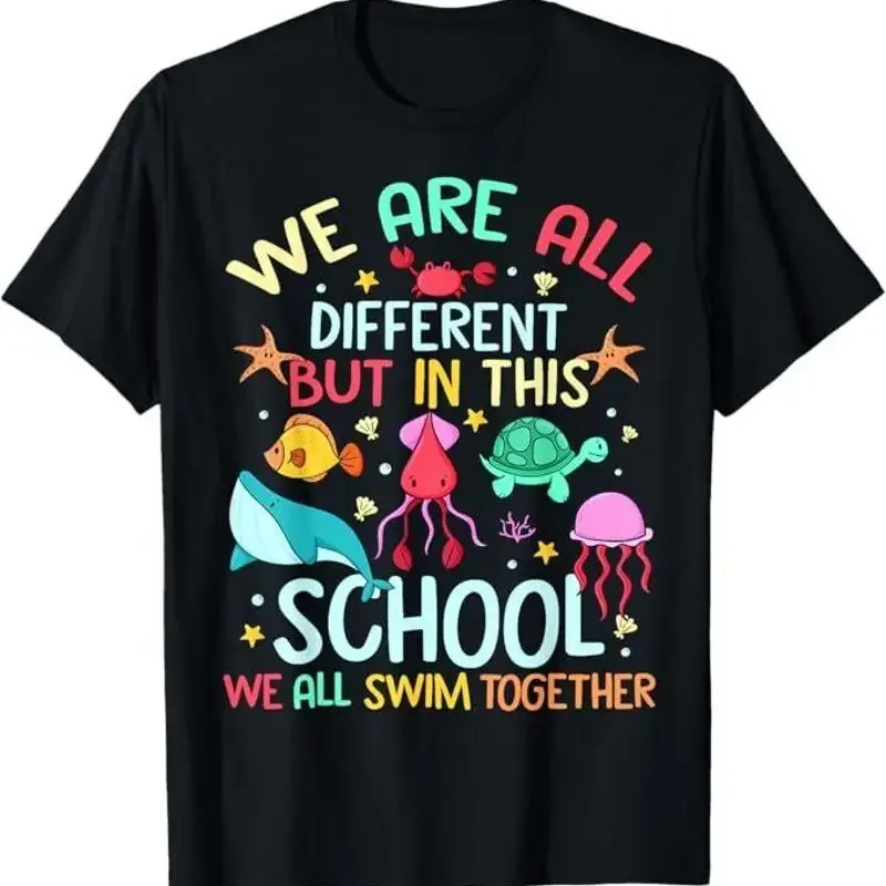 Nous sommes différents, mais dans cette école, nous nageons ensemble. T-shirt Ocean
