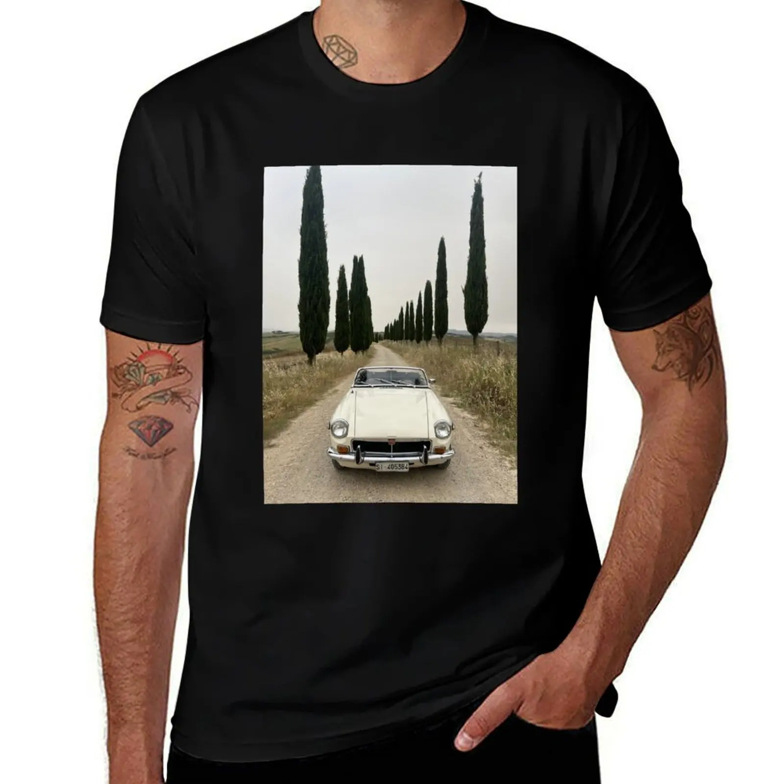 

MG MGB ina a field in Tuscany, surrounded by cypress, italian style travel car T-Shirt luxury designer men t shirts