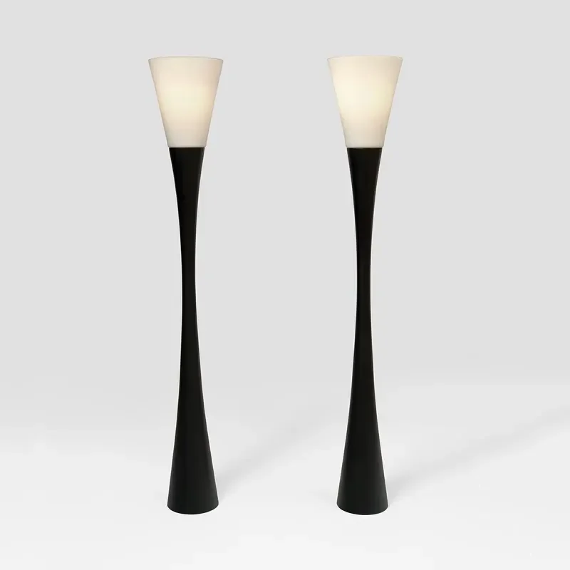 The French Cream-Style Floor Lamp in the Living Room Features a Modern, Simple and Design. It Creates a Cozy Atmosphere