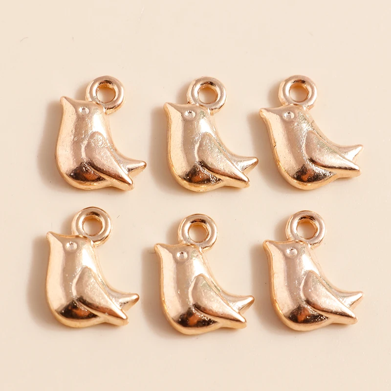 

Leslie 50pcs 8*11mm Gold Color Mini Dove Charms Pigeon Pendants for Jewelry Making DIY Earrings Necklaces Bracelet Wholesale