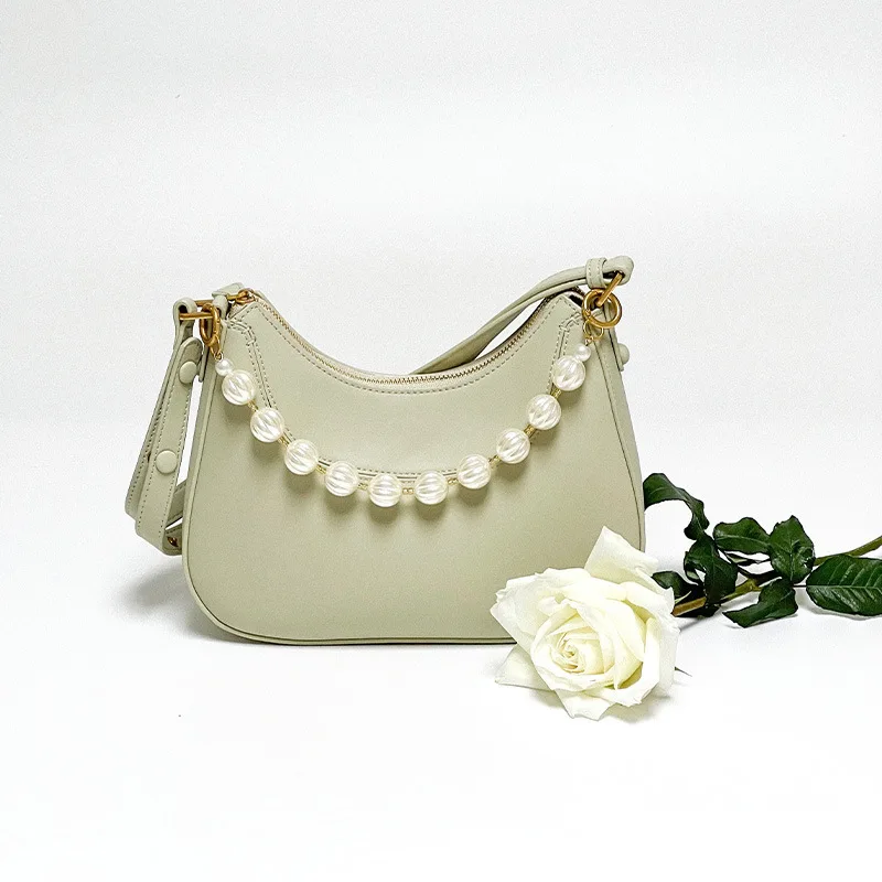 new pattern fashion Women Fashionable Ficus Shaped Pearl Packaging Decoration Chain Underarm Single Shoulder Crossbody Bag