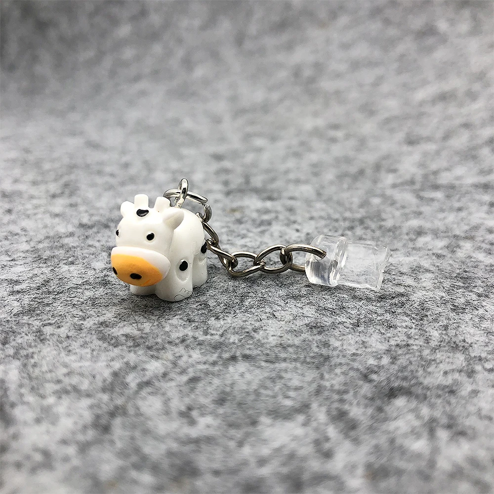 

Очаровательные практичные заглушки-антипыль из смолы в виде коровы для мобильных телефонов, планшетов, ноутбуков, портов USB-C и Lightning