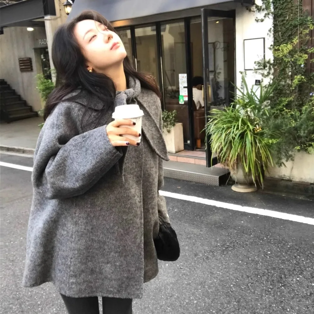 Cappotto di lana coreano con orecchie di coniglio Sle A-Line Capispalla di media lunghezza per le donne Stagione invernale Chiusura lunga con bottone singolo