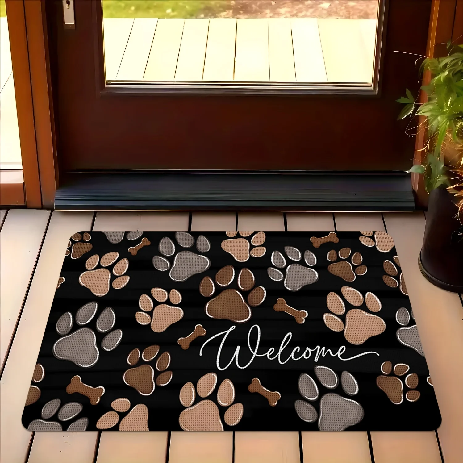Welcome mat with paw print and bone design, black with gold and white paws, perfect for bathroom, living room, bedroom, kitchen