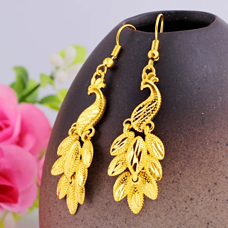 24-karaats gouden AU999 pawoorbellen in Koreaanse stijl voor dames |   Oud-beitel met reflecterende details, opvallend voor formele evenementen