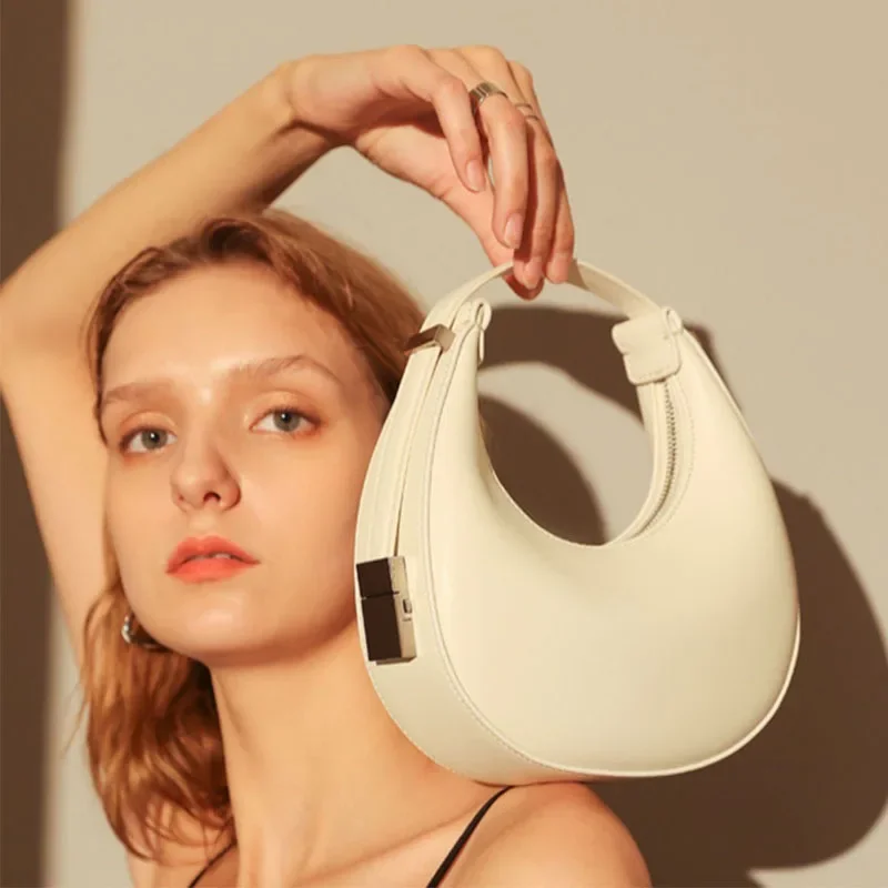 2023 Spring/summer Korean Version of Niche Crescent Moon Bag New One-shoulder Underarm Bag Female Trend Half Moon Saddle Bag dakota moon dakota moon 1 cd