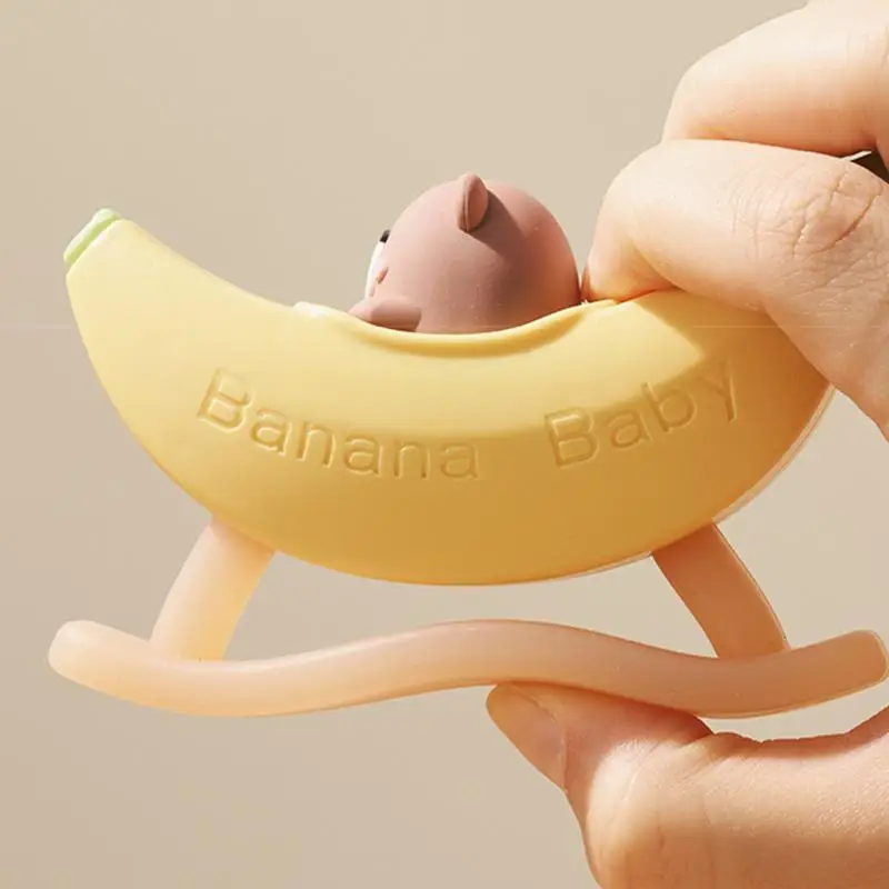 Fischietto per orsi di banana Giocattolo per strumenti per bambini Fischietti sportivi per addestramento dei cartoni animati Fischietto per giochi all'aperto in silicone con cordino Giocattoli musicali