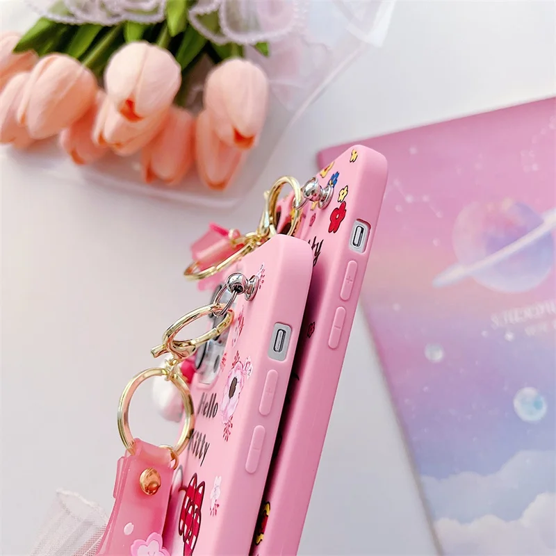 Funda de teléfono INS Flower Hello Kitty para iPhone 14 13 12 11 Pro Xs Max XR 7 8 TPU suave a prueba de golpes con llaveros de muñeca contraportada