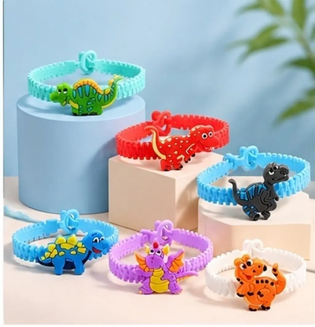 12Pcs Childrens Dinosaur PVC Bracelets Cute Flexible Wristbands for Party Halloween Birthday Goody Bag Filler Festival